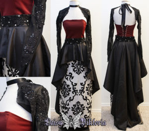 black and red evening gown with sleeves and train